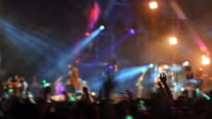 Motion blur summer music festival concert background.