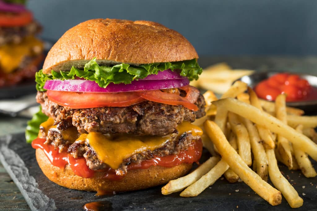 Homemade Cheese Smash Burger with Lettuce Tomato and Fries. Philadelphia June events 2025